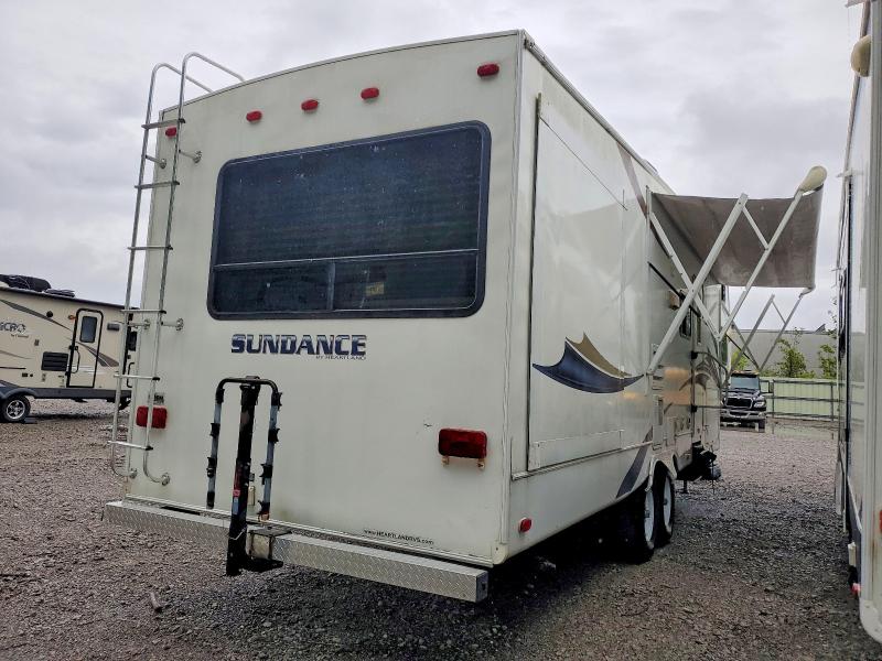 2010 Sundance Recreational vehicle (rv) VIN 5SFSG3527AE209382 COPART salvage auction — VANDALISM, NY - MV-907A SALVAGE CERTIFICATE, sold $1,600 on 2026-07-20 (photo 4)