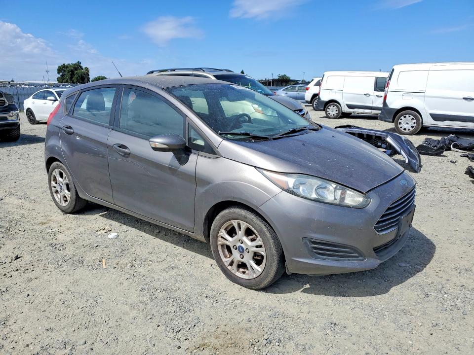2014 Ford Fiesta VIN 3FADP4EJ9EM121626 COPART salvage auction — NORMAL WEAR, Ca - Dis/Dlr/Exp Only Clean Title, sold $525 on 2026-07-02 (photo 4)