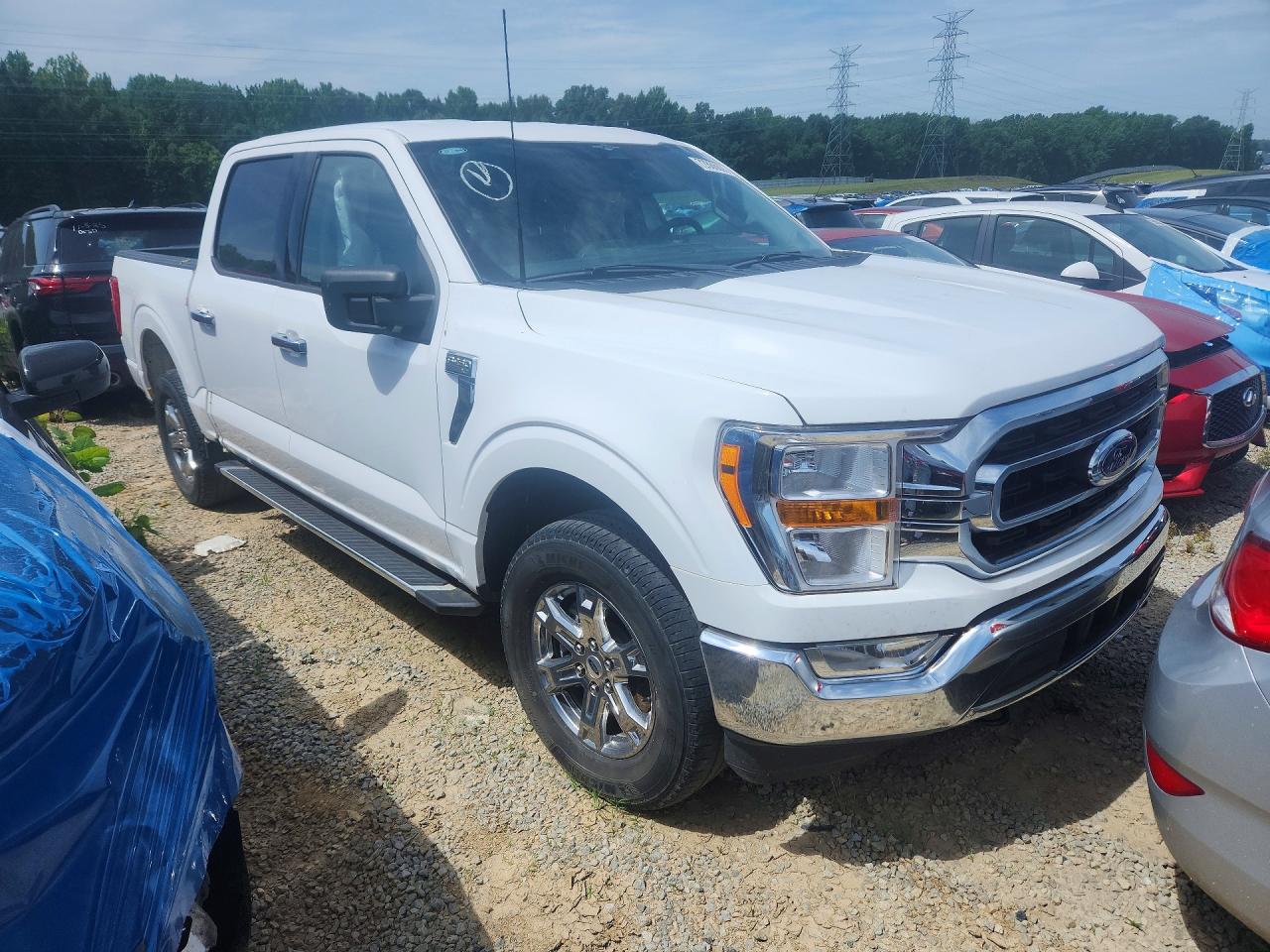 2023 Ford F-150 Lightning VIN 1FTEW1EP2PKD32567 COPART salvage auction — Side, TN - SALVAGE CERTIFICATE, sold $14,800 on 2026-07-03 (photo 4)