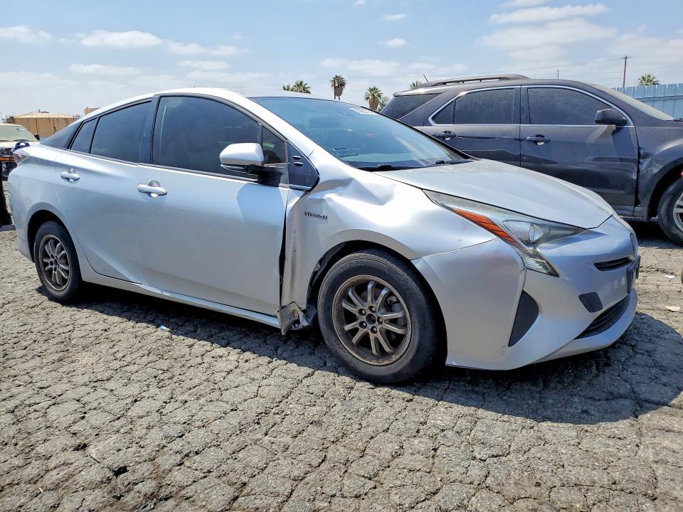 2017 Toyota Prius VIN JTDKBRFUXH3032398 COPART salvage auction — SIDE, Tx - Dis/Dlr/Exp Only Clean Title, sold $5,500 on 2026-07-13 (photo 4)