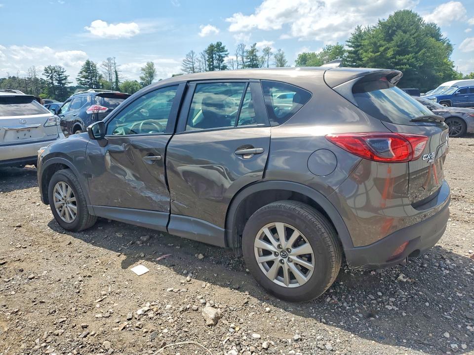 2016 Mazda VIN JM3KE4BY1G0751680 COPART salvage auction — SIDE, Md - Cert Of Salvage > 75% Damage, sold $2,000 on 2026-07-27 (photo 2)