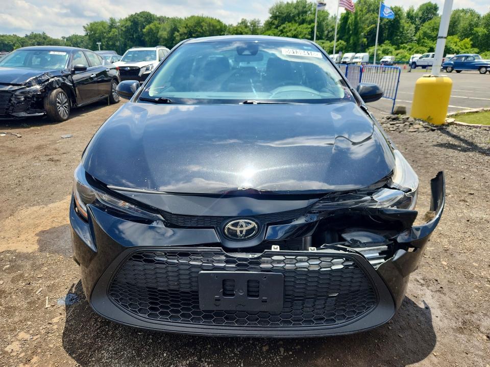 2022 Toyota Corolla VIN 5YFEPMAE8NP369219 COPART salvage auction — FRONT END, Fl - Certificate Of Title, sold $6,200 on 2026-07-06 (photo 5)