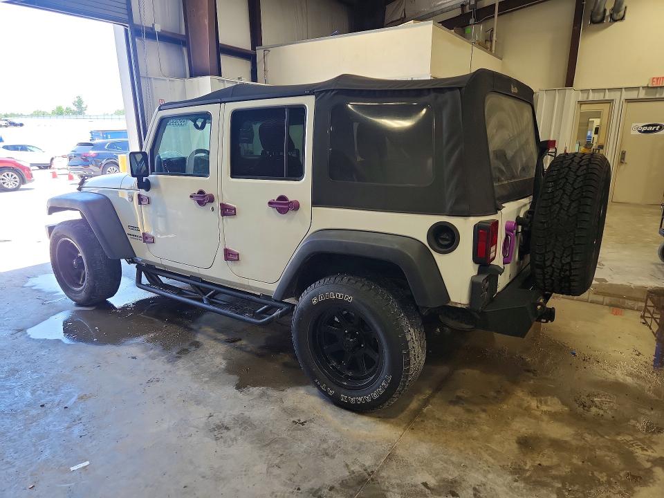 2014 Jeep Wrangler unlimited VIN 1C4BJWDG6EL113215 COPART salvage auction — NORMAL WEAR, In - Certificate Of Title, sold $1,600 on 2026-07-09 (photo 2)