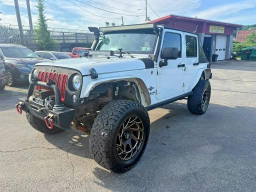 2014 Jeep Wrangler / VIN 1C4BJWDG7EL203909 — COPART salvage auction photo