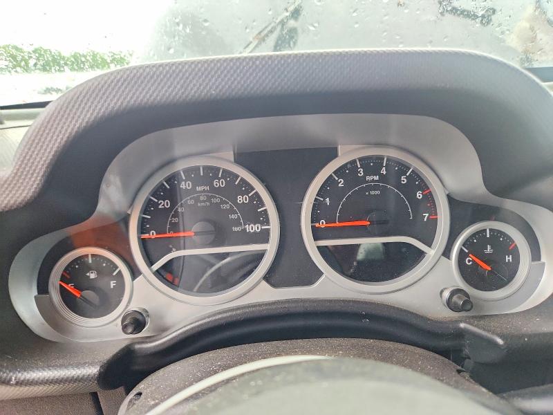 2009 Jeep Wrangler unlimited VIN 1J4GA59129L751093 COPART salvage auction — ENGINE BURN, Mi - Certificate Of Title, sold $725 on 2026-07-09 (photo 9)