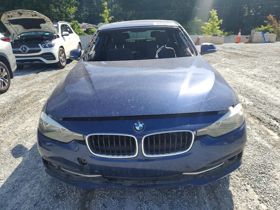 2017 BMW 3 series VIN WBA8B9G53HNU49915 COPART salvage auction — INTERIOR BURN, Ga - Cert Of Title-Salvage, sold $675 on 2026-07-13 (photo 5)