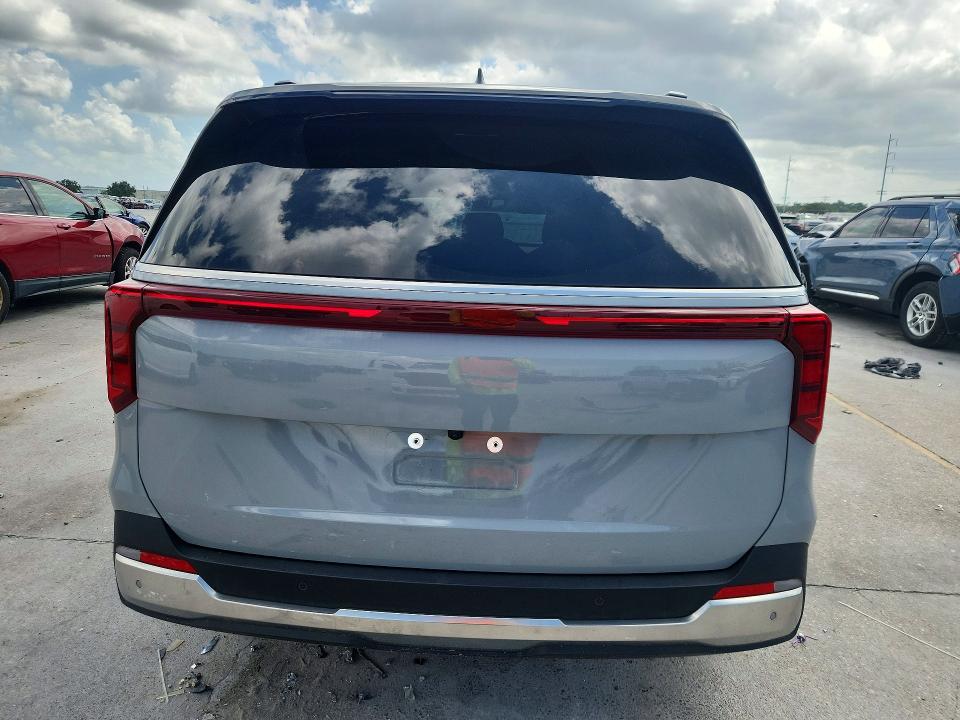 2026 Kia Carnival VIN KNDNE5K34T6571309 COPART salvage auction — WATER/FLOOD, LA - CERT OF TITLE-SALVAGE FLOOD, sold $16,700 on 2026-07-22 (photo 6)