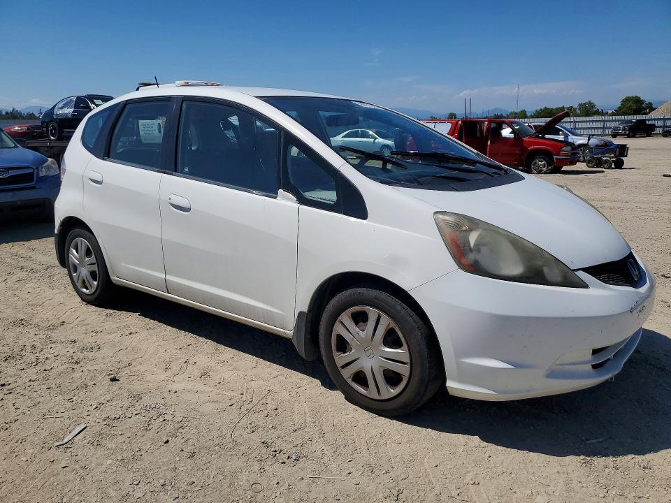 2009 Honda Fit VIN JHMGE882X9S021913 COPART salvage auction — MECHANICAL, Ca - Dis/Dlr/Exp Only Clean Title, sold $975 on 2026-07-10 (photo 4)