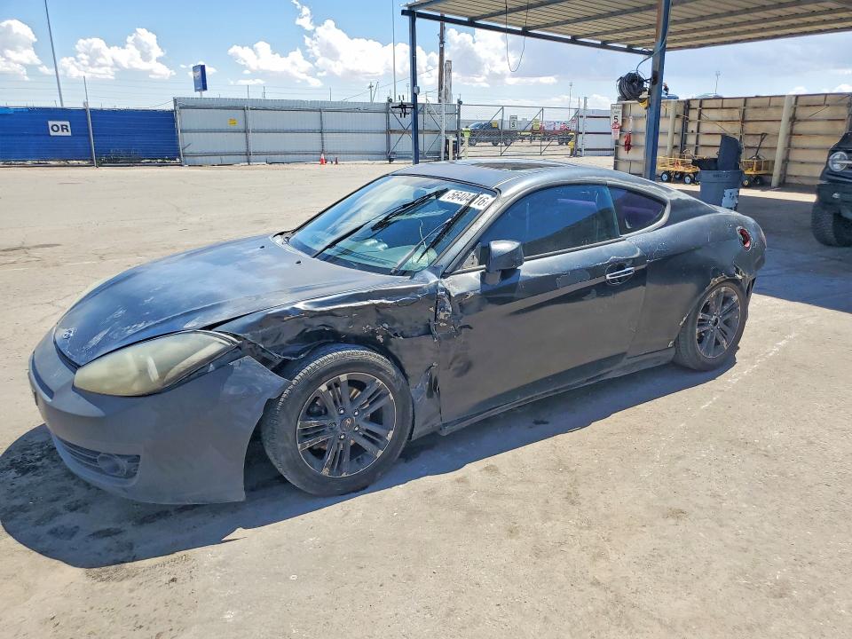2007 Hyundai Tiburon VIN KMHHM66D17U243934 COPART salvage auction — FRONT END, Tx - Salvage Vehicle Title, sold $275 on 2026-07-10 (photo 1)