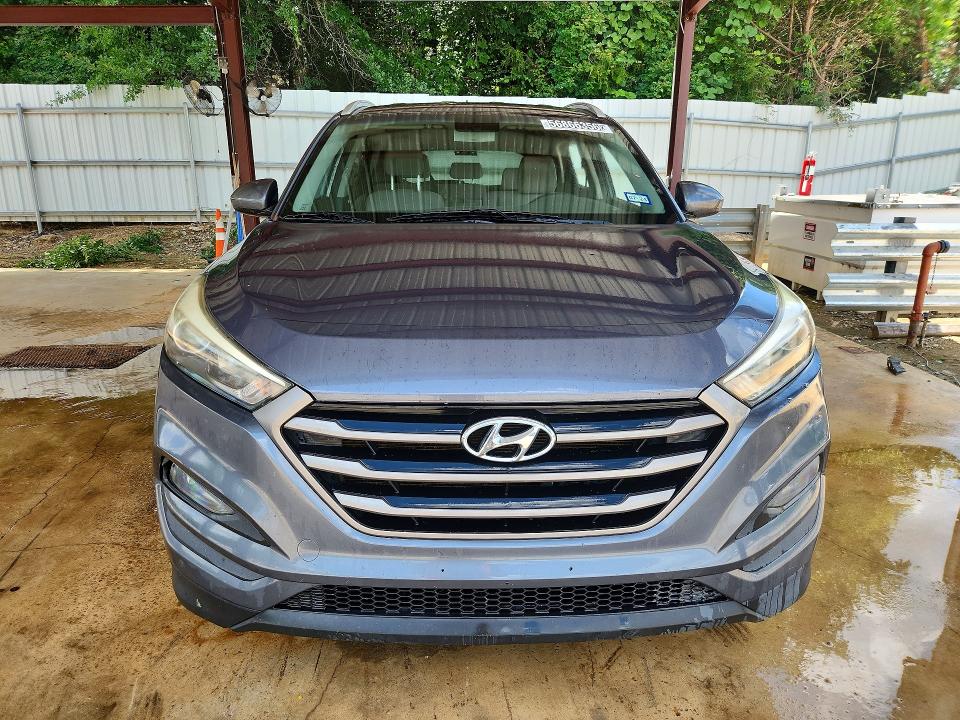 2016 Hyundai Tucson VIN KM8J33A42GU076252 COPART salvage auction — MINOR DENT/SCRATCHES, Tx - Certificate Of Title, sold $1,900 on 2026-07-21 (photo 5)