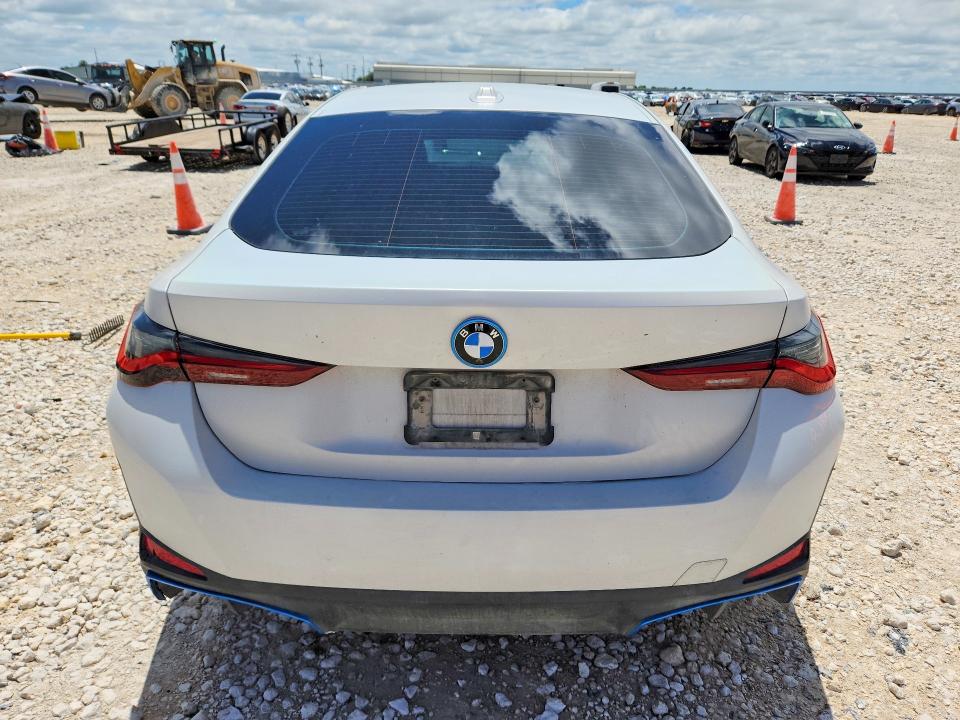2023 BMW VIN WBY73AW02PFP85873 COPART salvage auction — SIDE, TX - SALVAGE VEHICLE TITLE (P), sold $12,100 on 2026-07-23 (photo 6)