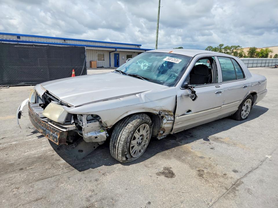 2004 Mercury Grand marquis VIN 2MEFM74W74X668924 COPART salvage auction — FRONT END, FL - CERT OF TITLE SLVG REBUILDABLE, sold $15 on 2026-07-21 (photo 1)