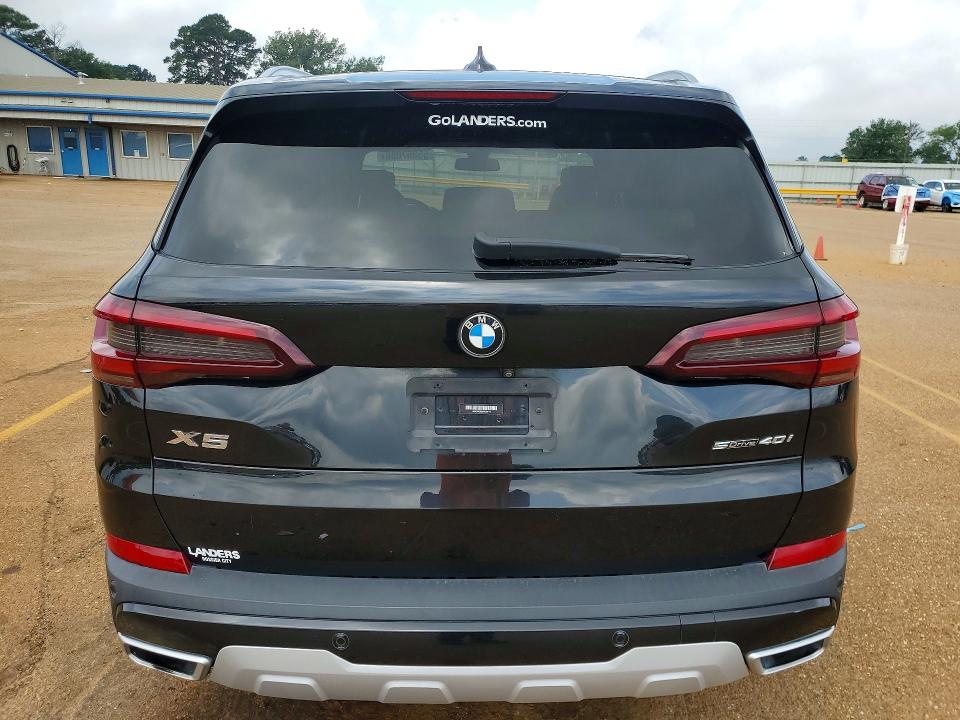 2021 BMW VIN 5UXCR4C00M9E64172 COPART salvage auction — SIDE, TX - SALVAGE VEHICLE TITLE (P), sold $1,550 on 2026-07-27 (photo 6)