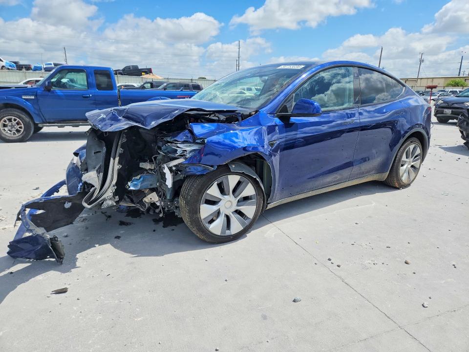 2023 Tesla Model y VIN 7SAYGDEE7PA063943 COPART salvage auction — FRONT END, Tx - Salvage Vehicle Title, sold $6,100 on 2026-07-24 (photo 1)