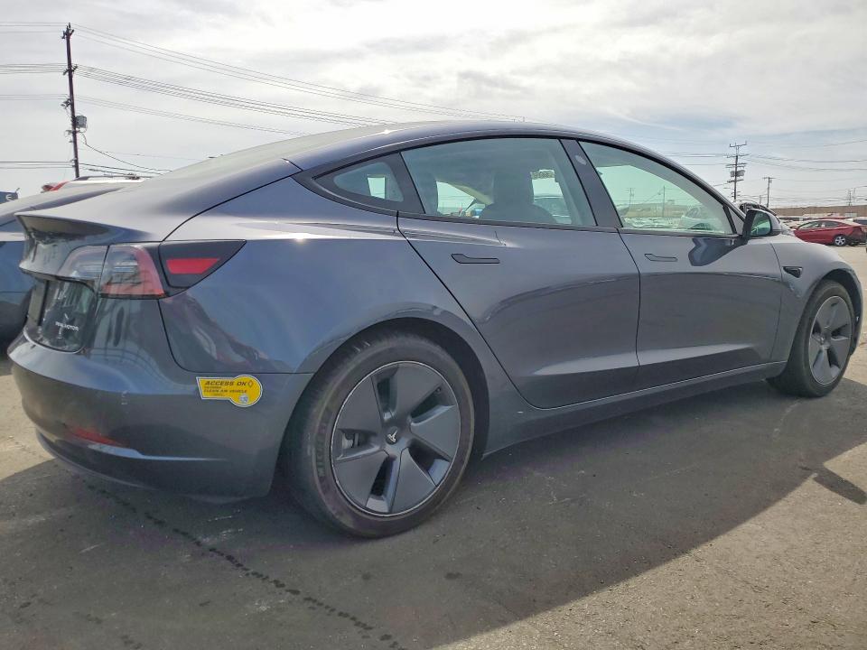 2022 Tesla Model 3 VIN 5YJ3E1EBXNF323012 COPART salvage auction — REAR END, Ca - Salvage Certificate, sold $8,700 on 2026-07-13 (photo 3)