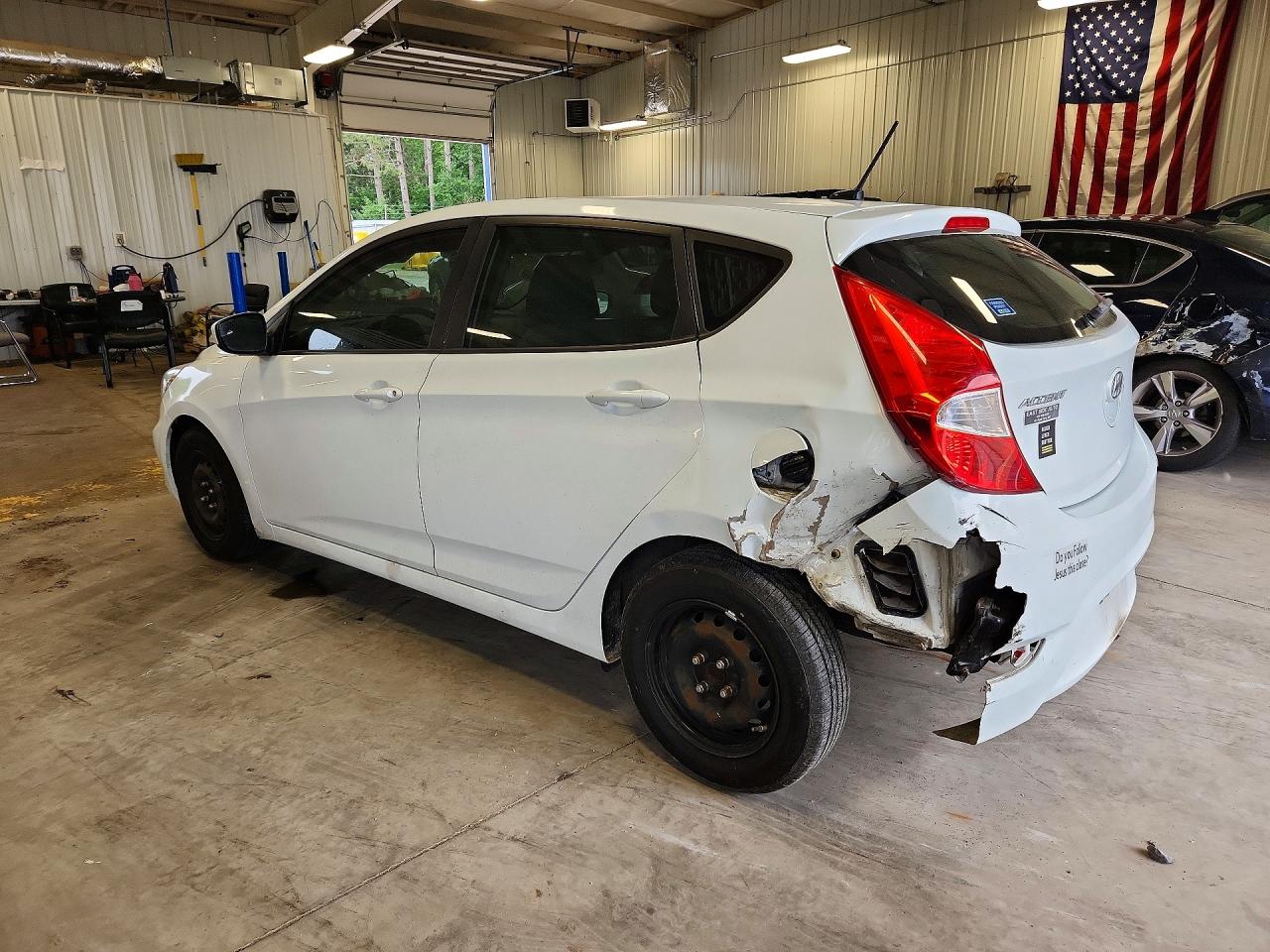 2016 Hyundai Accent VIN KMHCT5AEXGU241350 COPART salvage auction — Rear End, MN - CERT OF TITLE-PR SALV FLOOD, sold $725 on 2026-07-07 (photo 2)