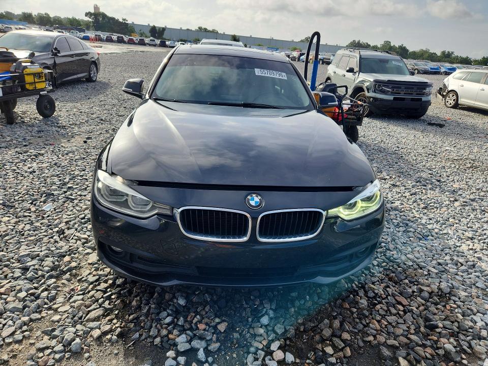 2018 BMW 3er VIN WBA8A9C5XJAH14726 COPART salvage auction — MINOR DENT/SCRATCHES, FL - CERTIFICATE OF TITLE, sold $1,050 on 2026-07-13 (photo 5)