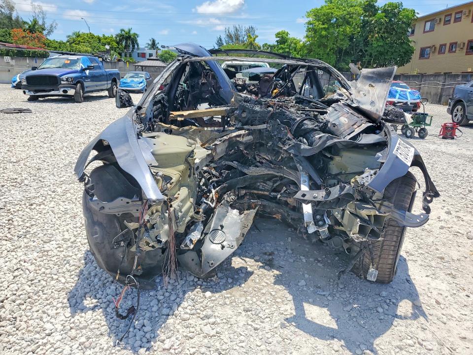 2019 Tesla Model 3 VIN 5YJ3E1EB2KF418529 COPART salvage auction — BURN, Fl - Certificate Of Destruction, sold $300 on 2026-07-31 (photo 5)