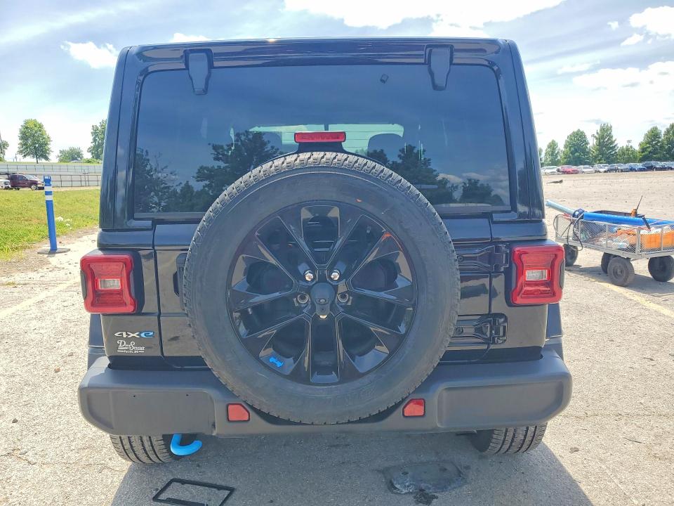 2023 Jeep Wrangler / VIN 1C4JJXP68PW553054 COPART salvage auction — MINOR DENT/SCRATCHES, Mo - Certificate Of Title, sold $21,000 on 2026-07-02 (photo 6)
