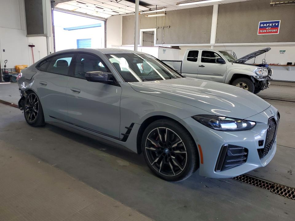 2024 BMW VIN WBY33AW00RFR71378 COPART salvage auction — REAR END, Wa - Bill Of Sale, sold $20,700 on 2026-07-17 (photo 4)