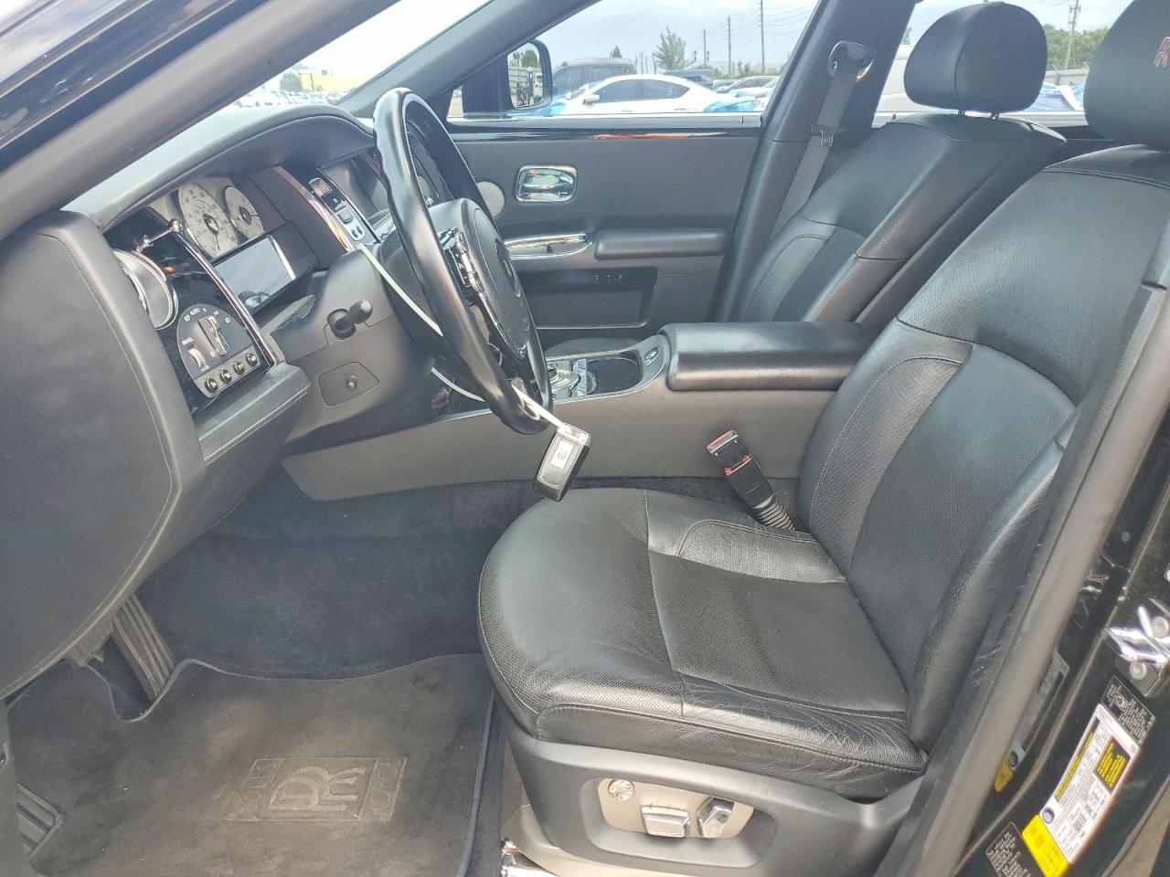 2010 Rolls-Royce Ghost VIN SCA664S55AUX48611 COPART salvage auction — Damage History, FL - CERT OF TITLE-REBUILT, sold $21,300 on 2026-07-07 (photo 7)