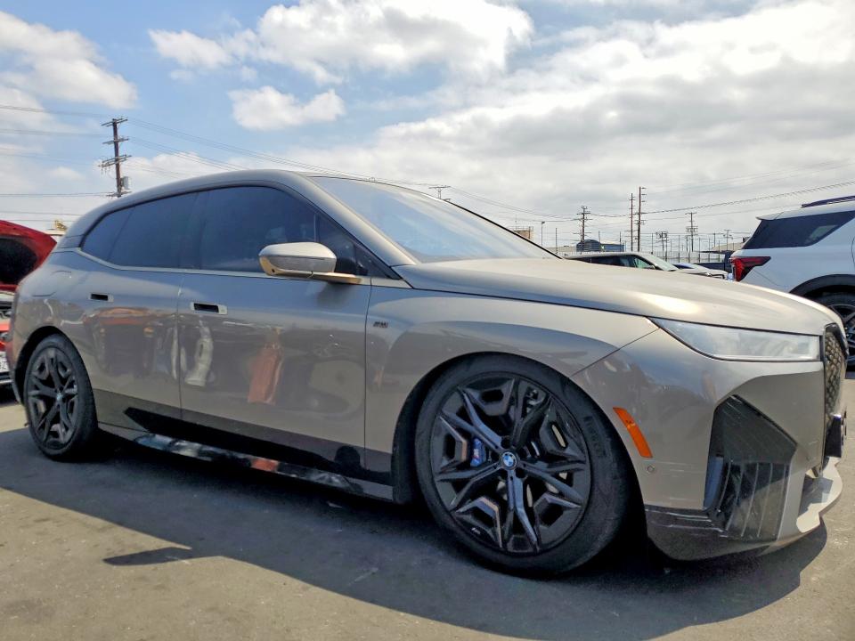 2023 BMW Ix VIN WB533CF01PCM04541 COPART salvage auction — REAR END, Ca - Salvage Certificate, sold $7,200 on 2026-08-19 (photo 4)