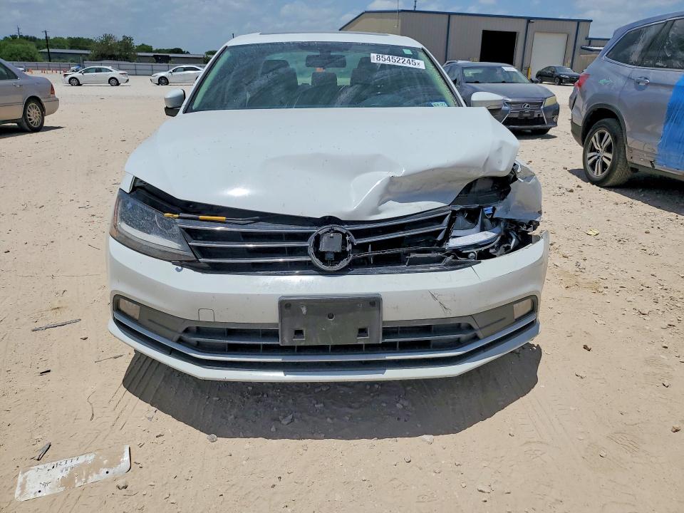 2017 Volkswagen Jetta VIN 3VWL17AJ6HM334064 COPART salvage auction — FRONT END, Tx - Salvage Vehicle Title, sold $3,450 on 2026-07-09 (photo 5)