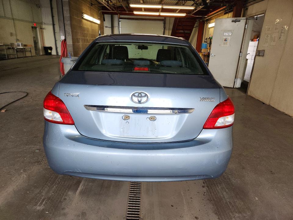 2010 Toyota Yaris VIN JTDBT4K32A4073038 COPART salvage auction — MINOR DENT/SCRATCHES, Ak - Cert Of Veh Title-Reconstructe, sold $1,150 on 2026-07-07 (photo 6)