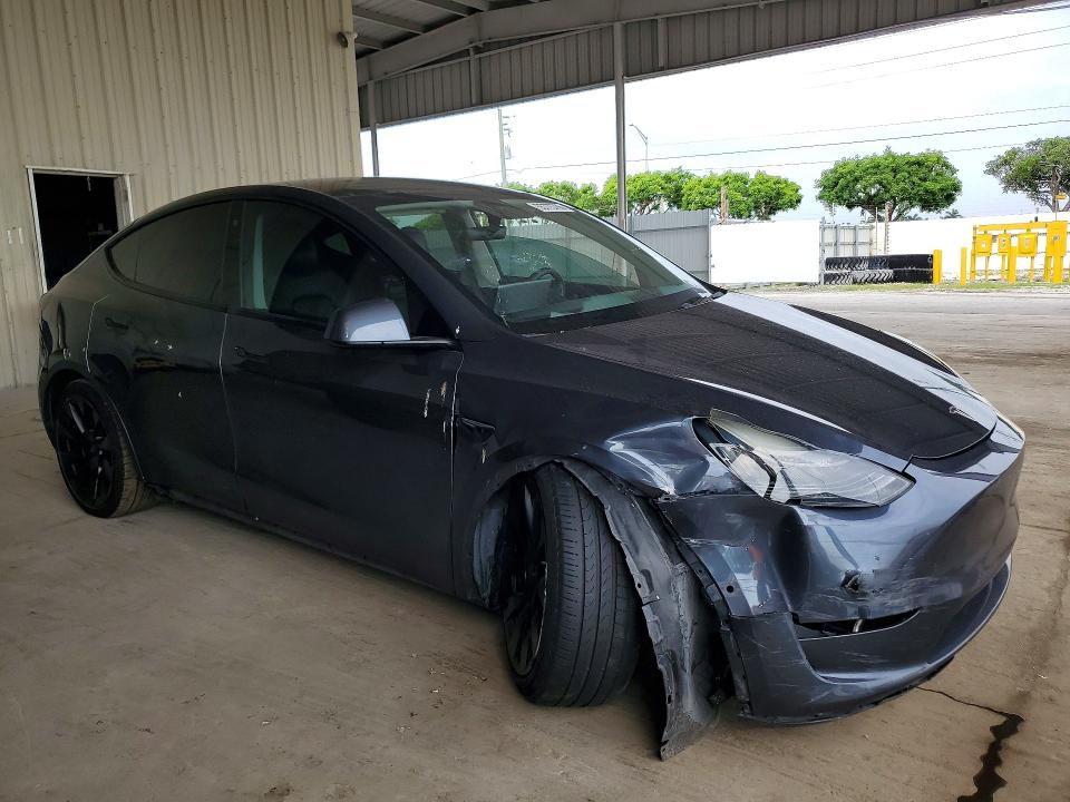 2020 Tesla VIN 5YJYGDEE0LF010947 COPART salvage auction — FRONT END, Fl - Cert Of Title Slvg Rebuildable, sold $8,800 on 2026-07-08 (photo 4)