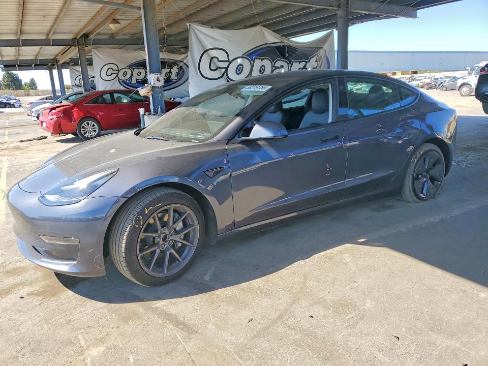 2023 Tesla Model 3 VIN 5YJ3E1EAXPF676358 — COPART salvage auction photo