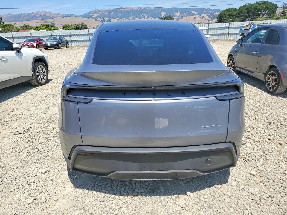 2026 Tesla Model y VIN 7SAYGDEEXTF460740 COPART salvage auction — SIDE, Ca - Salvage Certificate, sold $8,500 on 2026-07-21 (photo 6)