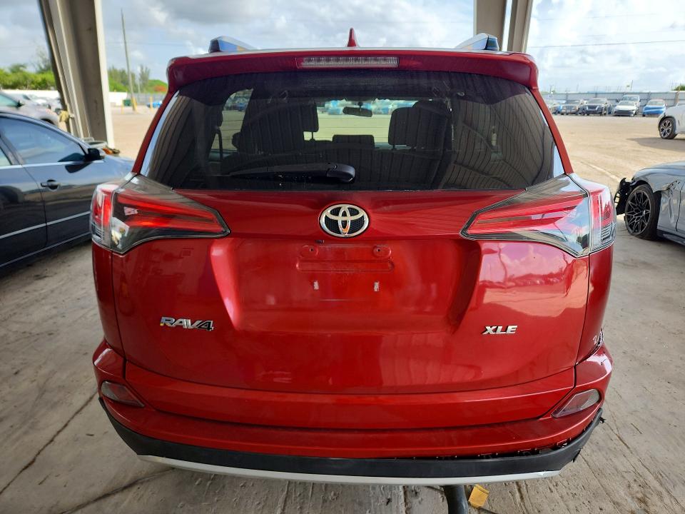 2016 Toyota VIN JTMWFREV4GJ073331 COPART salvage auction — SIDE, Fl - Cert Of Title Slvg Rebuildable, sold $4,050 on 2026-07-22 (photo 6)