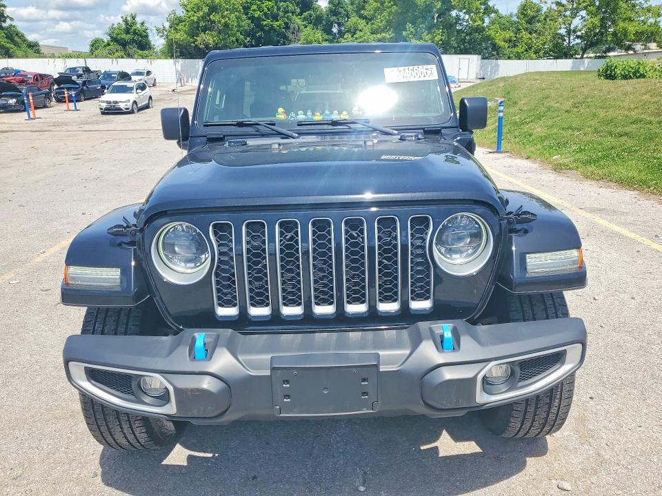 2023 Jeep Wrangler / VIN 1C4JJXP68PW553054 COPART salvage auction — MINOR DENT/SCRATCHES, Mo - Certificate Of Title, sold $21,000 on 2026-07-02 (photo 5)
