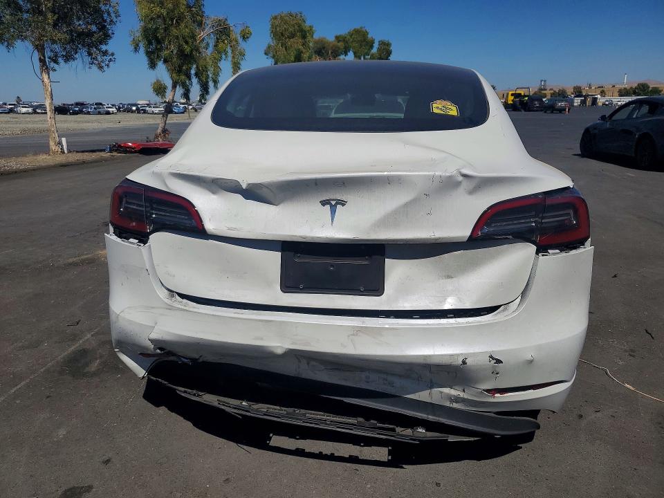2023 Tesla VIN 5YJ3E1EA1PF709361 COPART salvage auction — REAR END, CA - SALVAGE CERTIFICATE, sold $10,000 on 2026-07-27 (photo 6)