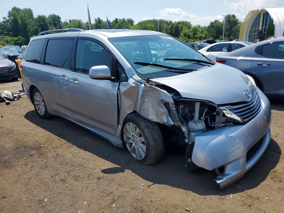 2014 Toyota Sienna VIN 5TDDK3DC0ES078543 COPART salvage auction — ALL OVER, CT - CERT OF TITLE-SALVAGE, sold $1,700 on 2026-07-16 (photo 4)