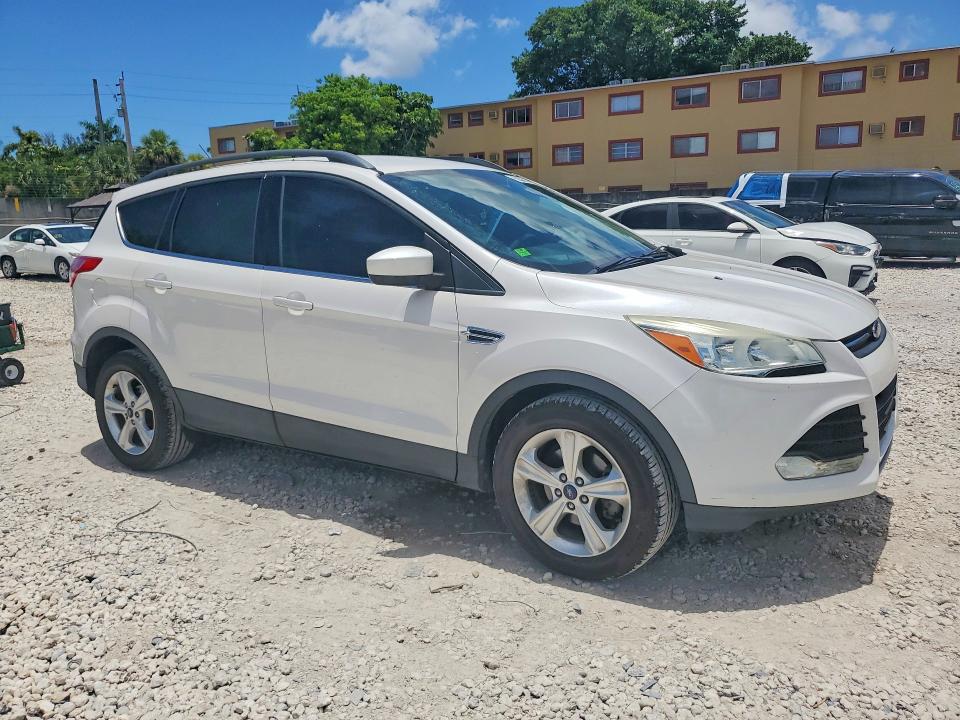 2016 Ford Escape VIN 1FMCU0GX6GUC19905 COPART salvage auction — SIDE, Fl - Cert Of Title Slvg Rebuildable, sold $1,650 on 2026-07-02 (photo 4)