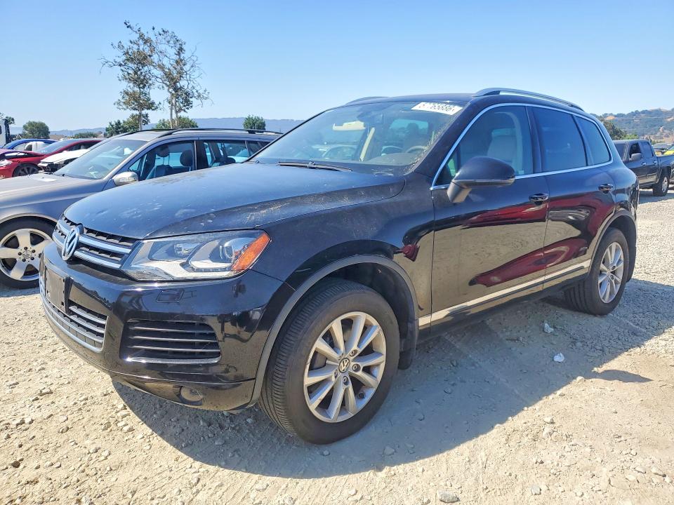 2013 Volkswagen Touareg VIN WVGEF9BP4DD013797 COPART salvage auction — MINOR DENT/SCRATCHES, Ca - Dis/Dlr/Exp App For Dup Clean, sold $2,950 on 2026-07-16 (photo 1)