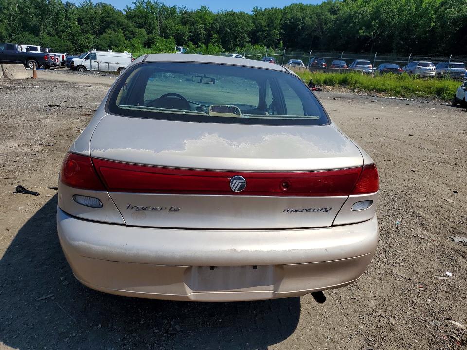 1997 Mercury Tracer VIN 1MELM13P1VW660339 COPART salvage auction — FRONT END, MD - CERT OF SALVAGE > 75% DAMAGE (P), sold $125 on 2026-07-21 (photo 6)
