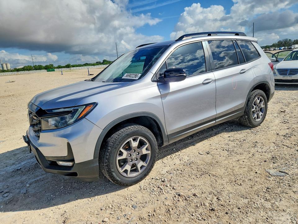2023 Honda Passport VIN 5FNYF8H65PB028820 — COPART salvage auction photo
