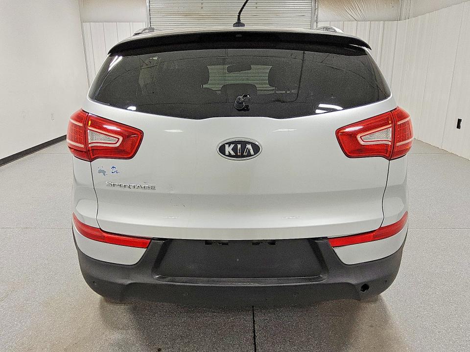 2012 Kia Sportage VIN KNDPB3A23C7247339 COPART salvage auction — NORMAL WEAR, WV - CERTIFICATE OF TITLE, sold $1,300 on 2026-07-16 (photo 6)