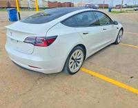 2021 Tesla Model 3 VIN 5YJ3E1EA4MF870380 COPART salvage auction — MINOR DENT/SCRATCHES, TX - CERTIFICATE OF TITLE (P), sold $8,100 on 2026-07-14 (photo 4)