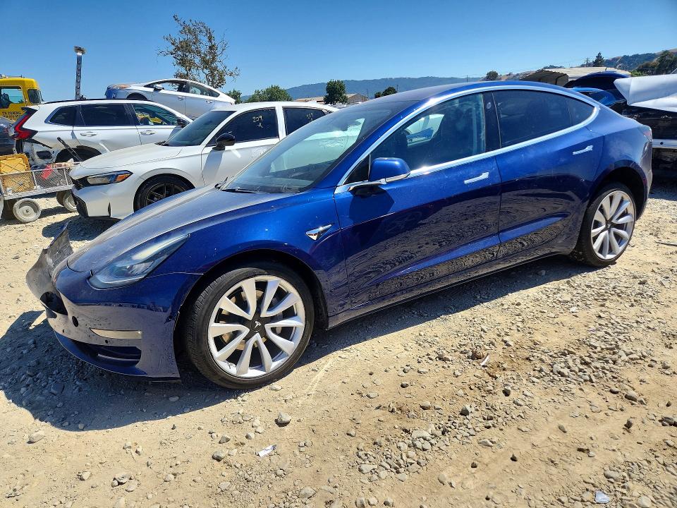 2017 Tesla Model 3 VIN 5YJ3E1EA2HF001976 COPART salvage auction — FRONT END, CA - SALVAGE CERTIFICATE, sold $4,100 on 2026-07-14 (photo 1)