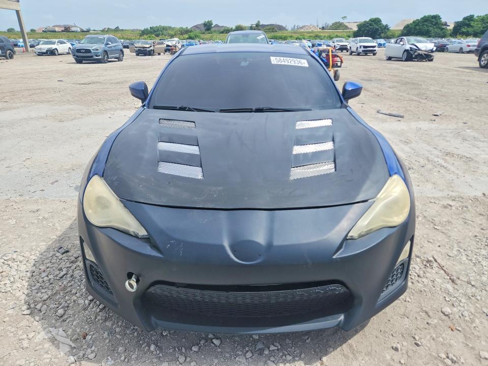 2013 Scion VIN JF1ZNAA15D2732260 COPART salvage auction — ROOF, Fl - Certificate Of Title, sold $2,500 on 2026-07-09 (photo 5)