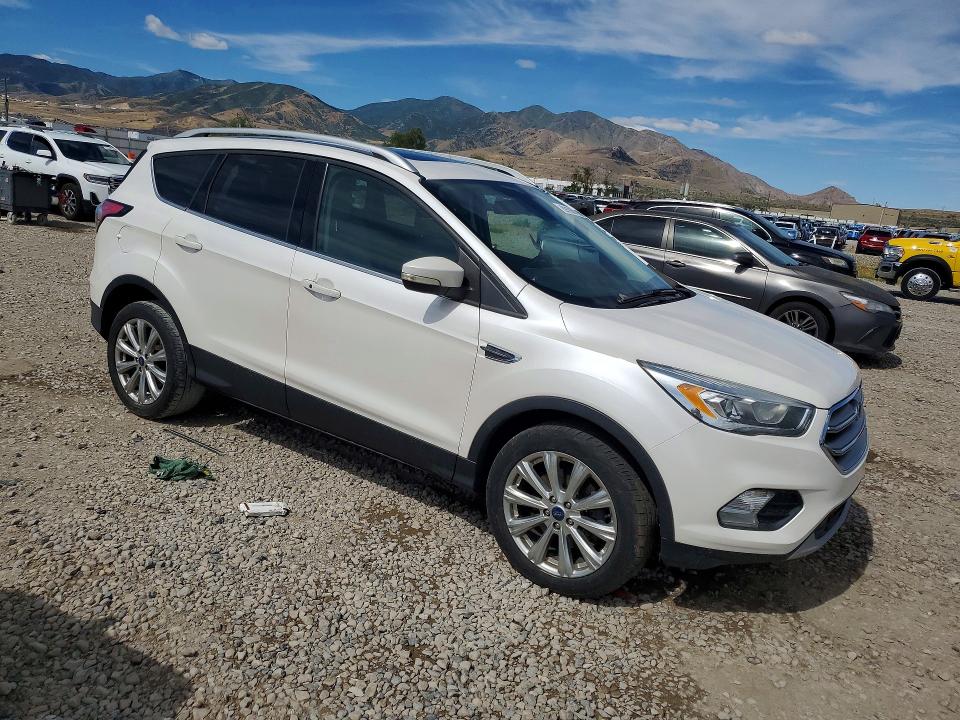 2017 Ford Escape VIN 1FMCU9J97HUE04173 COPART salvage auction — MINOR DENT/SCRATCHES, Ut - Cert Of Title-Rebuilt/Restored, sold $425 on 2026-07-04 (photo 4)