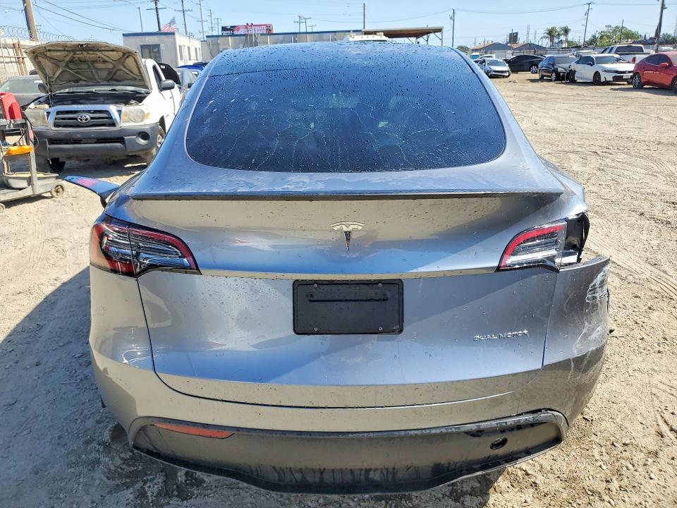 2024 Tesla Model y VIN 7SAYGDEE0RA288000 COPART salvage auction — REAR END, Ca - Salvage Certificate, sold $7,000 on 2026-07-13 (photo 6)