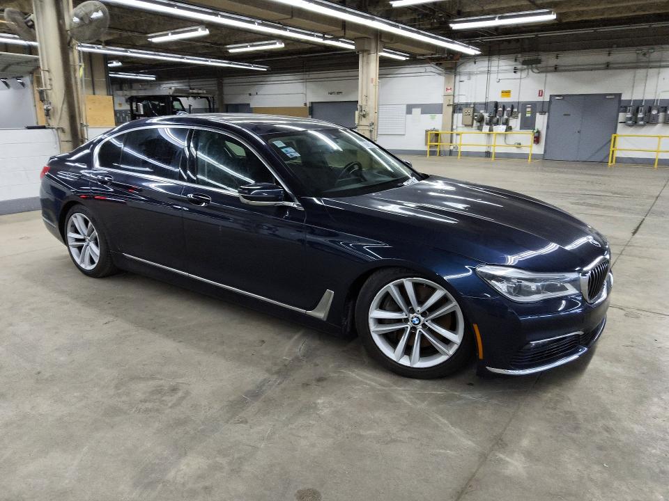 2016 BMW 7 series VIN WBA7F2C53GG418261 COPART salvage auction — HAIL, Il - Certificate Of Title, sold $3,650 on 2026-07-28 (photo 4)