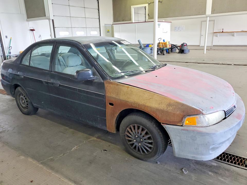 1998 Mitsubishi Mirage VIN JA3AY26A8WU036110 COPART salvage auction — MINOR DENT/SCRATCHES, Wa - Aff In Lieu Of Title - Rebuilt, sold $1,221 on 2026-07-06 (photo 4)