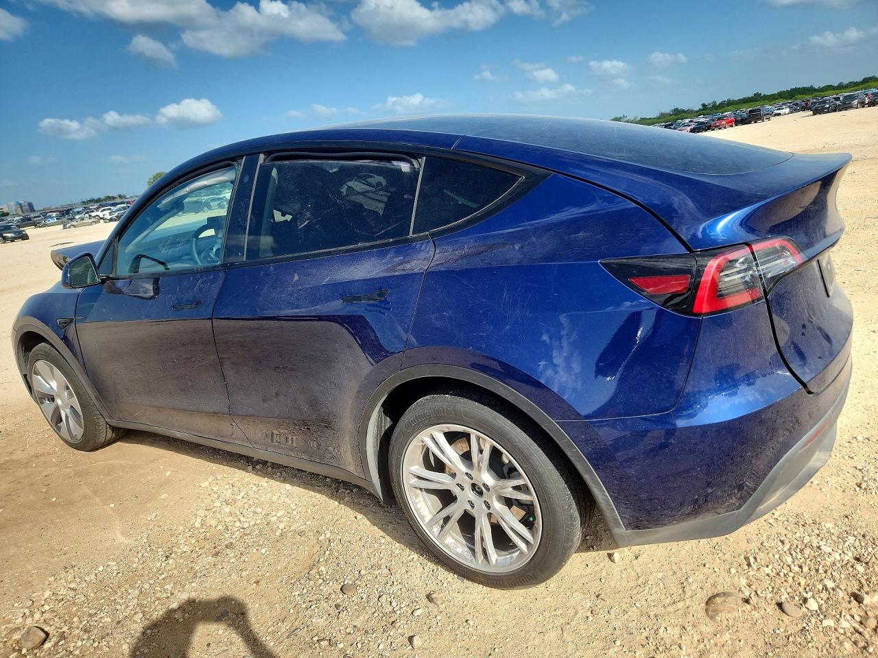 2023 Tesla Model Y VIN 7SAYGDEE6PA107897 COPART salvage auction — Front End, TX - SALVAGE VEHICLE TITLE, sold $9,000 on 2026-07-09 (photo 2)