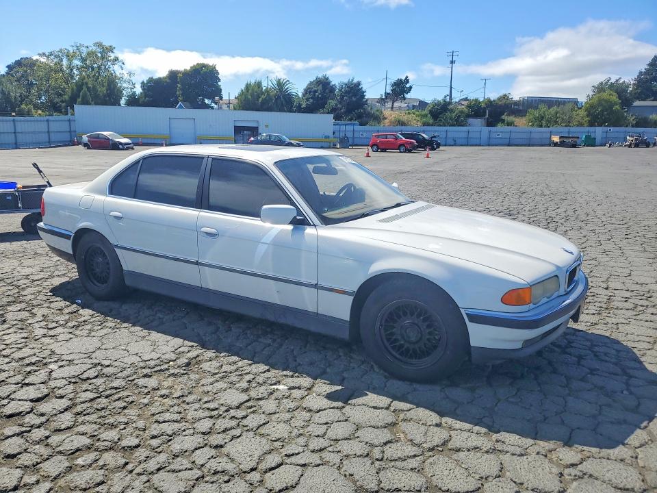 1999 BMW 7 series VIN WBAGH8335XDP03041 COPART salvage auction — MINOR DENT/SCRATCHES, Ca - Dis/Dlr/Exp Only Clean Title, sold $325 on 2026-07-16 (photo 4)