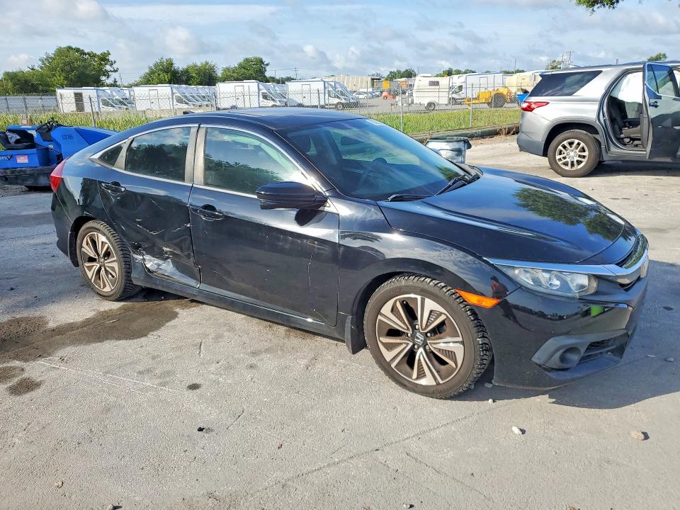 2016 Honda VIN 2HGFC1F30GH630441 COPART salvage auction — SIDE, FL - CERT OF TITLE SLVG REBUILDABLE, sold $4,600 on 2026-07-02 (photo 4)